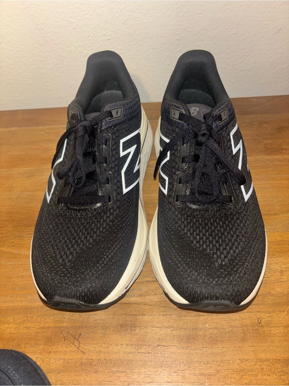 New Balance women Black and White Lace-Up Sneakers